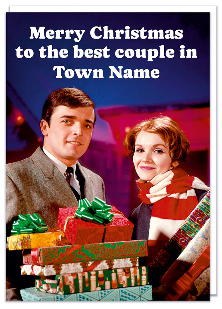 A funny personalisable Christmas card with a 1960s picture of a smiling couple holding christmas presents with white text above them that reads Merry Christmas to the best couple in - town name